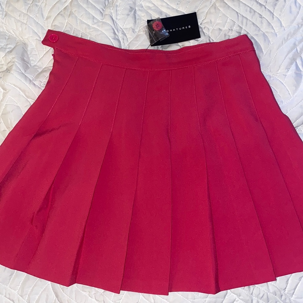 Pink pleated tennis skirt